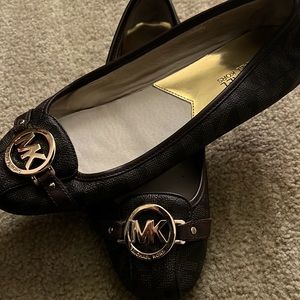 Michael Kors flats with gold accent. Womens size 10, light wear, no box